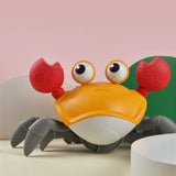 Close-up of the LED lights glowing on the Musical Crawling Crab Toy